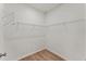 Spacious walk-in closet with wood-look floors and wire shelving at 121 Cribbs Ln, Middlesex, NC 27557