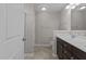 Bathroom with a double sink vanity and a shower at 124 Myatt Fern Dr, Garner, NC 27529