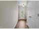 Inviting foyer with hardwood floors, a bright door and a neutral color palette at 124 Myatt Fern Dr, Garner, NC 27529