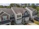 Charming townhomes boast unique architectural details, attached garages, and well-maintained landscaping at 124 Myatt Fern Dr, Garner, NC 27529
