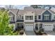 Inviting exterior view of a well-maintained townhome with attached garage at 124 Myatt Fern Dr, Garner, NC 27529