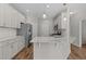 Contemporary kitchen featuring granite countertops and stainless steel appliances at 124 Myatt Fern Dr, Garner, NC 27529