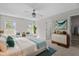 Comfortable main bedroom featuring a ceiling fan, and cozy decor at 124 Myatt Fern Dr, Garner, NC 27529