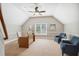Home office featuring vaulted ceiling, ceiling fan, neutral paint, and natural light at 12428 Penrose Trl, Raleigh, NC 27614
