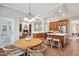Bright and airy kitchen with modern appliances and adjacent breakfast nook at 12428 Penrose Trl, Raleigh, NC 27614