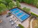 Aerial view of the community pickleball courts featuring multiple courts and parking at 12428 Penrose Trl, Raleigh, NC 27614