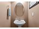 Half bathroom featuring a vanity with a sink and mirror at 1302 Ingle Ct, Burlington, NC 27215