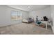 Well lit bedroom with space for a work area and desk at 1302 Ingle Ct, Burlington, NC 27215