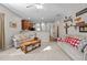 Bright living room with hardwood floors, natural light, and a view of the staircase at 1302 Ingle Ct, Burlington, NC 27215