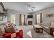 Bright living room with a cozy fireplace, neutral decor, and ample seating at 1302 Ingle Ct, Burlington, NC 27215