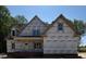 New home under construction with a brick foundation ready for siding and exterior finishes at 1589 S Old Carriage Rd, Rocky Mount, NC 27804
