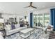 Bright living room featuring an open floor plan, comfortable seating, and stylish décor at 1601 Garden Park Cir, Fuquay Varina, NC 27526
