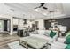 Open-concept living space features a large island and modern finishes at 1609 Garden Park Cir, Fuquay Varina, NC 27526
