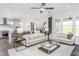 Open-concept living area seamlessly connects to the kitchen and dining, maximizing space at 1610 Garden Park Cir, Fuquay Varina, NC 27526