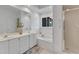 Well-lit bathroom with double sinks, a soaking tub, and a separate shower stall at 1913 Wild Dunes Dr, Raleigh, NC 27604