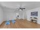 Spacious bonus room with hardwood floors, ceiling fan and doorway to another room at 1913 Wild Dunes Dr, Raleigh, NC 27604