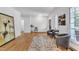 Spacious living room features hardwood floors, light walls, and elegant decor at 1913 Wild Dunes Dr, Raleigh, NC 27604