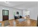 Bright living room with hardwood floors, neutral walls, and stylish furniture arrangement at 1913 Wild Dunes Dr, Raleigh, NC 27604