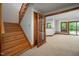 Basement space with walkout, natural light, and stairs at 201 Summergate Cir, Chapel Hill, NC 27516