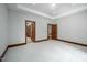 Spacious bedroom with neutral carpet, base trim, and recessed lighting, showcasing an inviting atmosphere at 201 Summergate Cir, Chapel Hill, NC 27516