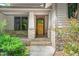 Close up of the front entry, columns, and stone accents at 201 Summergate Cir, Chapel Hill, NC 27516
