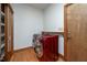 Modern laundry room equipped with stainless red washer and dryer, plus storage at 201 Summergate Cir, Chapel Hill, NC 27516