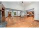 Spacious living room featuring hardwood floors, wooden cabinets, and an entryway at 201 Summergate Cir, Chapel Hill, NC 27516
