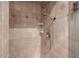 Modern shower with beige tile, offering a spa-like experience with a detachable shower head at 201 Summergate Cir, Chapel Hill, NC 27516