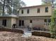 Exterior of house with patio area, outdoor grill, and ample space for entertaining and relaxation at 202 Selkirk Pl, Durham, NC 27707