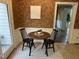 Cozy breakfast nook featuring a round table and two chairs with adjacent outdoor access at 202 Selkirk Pl, Durham, NC 27707