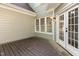 Inviting back deck with access to the home, offering a comfortable outdoor living space at 216 Billingrath Turn Ln, Cary, NC 27519