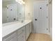 Bathroom with white vanity and neutral tile floors at 216 Billingrath Turn Ln, Cary, NC 27519