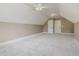 Spacious room with plush carpeting and modern ceiling fan at 216 Billingrath Turn Ln, Cary, NC 27519