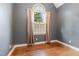 Cozy bedroom with natural lighting and hardwood floors at 216 Billingrath Turn Ln, Cary, NC 27519