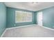 Stylish bedroom with light walls and bright window at 216 Billingrath Turn Ln, Cary, NC 27519