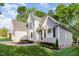 Beautiful home exterior with a manicured lawn, detailed entrance, and gorgeous curb appeal at 216 Billingrath Turn Ln, Cary, NC 27519
