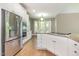 Kitchen showcases stainless steel appliances, granite counters, and ample cabinet space at 216 Billingrath Turn Ln, Cary, NC 27519