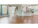 Expansive living space connects to a modern kitchen with stainless-steel appliances at 216 Billingrath Turn Ln, Cary, NC 27519
