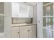Charming wet bar features granite counters and white cabinets at 216 Billingrath Turn Ln, Cary, NC 27519