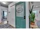 Hallway with laundry door and modern decor throughout at 2442 Stevens Rd, Raleigh, NC 27610