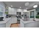 Modern kitchen featuring stainless steel appliances, and ample lighting at 2442 Stevens Rd, Raleigh, NC 27610