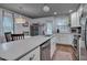 Bright kitchen offering stainless steel appliances, ample counter space, and stylish finishes at 2442 Stevens Rd, Raleigh, NC 27610