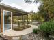 The home's backyard boasts a custom waterfall, meticulous landscaping, and access to a screened porch at 2581 Green Valley Blvd, Burlington, NC 27217