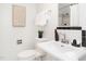 The bathroom features a modern toilet and sink combination that is both functional and stylish at 2581 Green Valley Blvd, Burlington, NC 27217