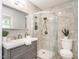 Elegant bathroom featuring modern fixtures, sleek tiling, and a glass-enclosed shower for a spa-like experience at 2581 Green Valley Blvd, Burlington, NC 27217