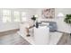 Bright living room featuring ample natural light, designer decor and contemporary furniture at 2581 Green Valley Blvd, Burlington, NC 27217