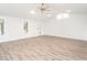 Spacious living room with natural light and wood floors, ideal for entertaining and relaxation at 2581 Green Valley Blvd, Burlington, NC 27217