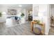 Open concept living room that flows into a bright and modern kitchen at 2581 Green Valley Blvd, Burlington, NC 27217