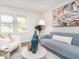 Bright and airy living room showcasing stylish decor, large windows, and modern furnishings at 2581 Green Valley Blvd, Burlington, NC 27217
