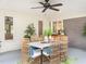 Outdoor patio with seating, ceiling fan, and space for entertaining friends and Gathering at 2581 Green Valley Blvd, Burlington, NC 27217